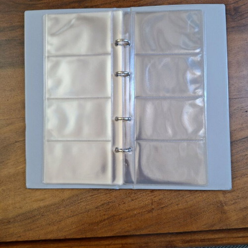 Card binder for phone cards new, 8 sleeves, 64 slots