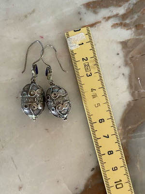 Handmade silver earrings used