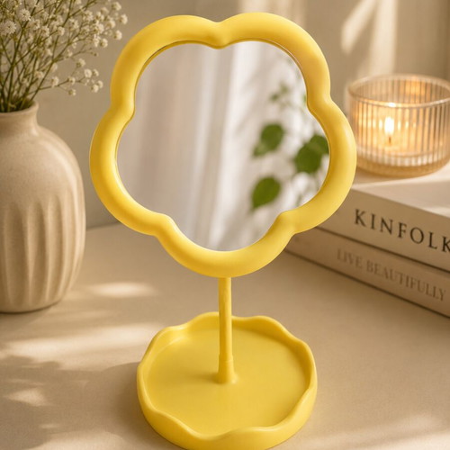 Yellow flower-shaped mirror like new with jewelry base