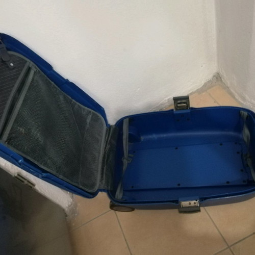 Hard plastic suitcase with lock and wheels
