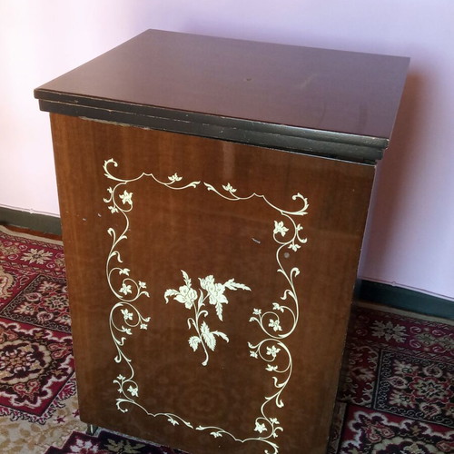 Mrsedes sewing machine used with antique furniture