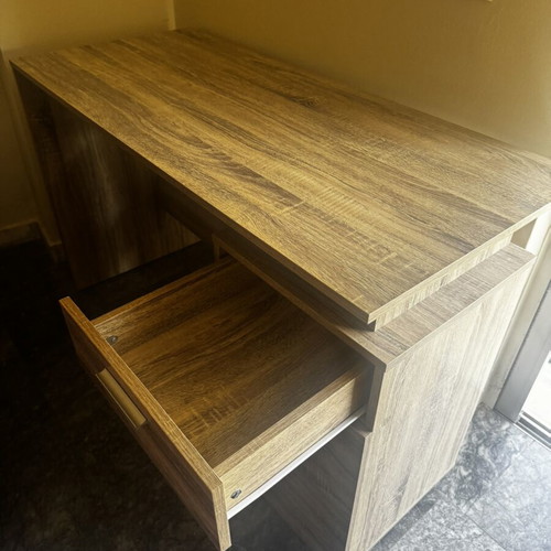 Wooden desk with drawer and open storage, brown oak finish