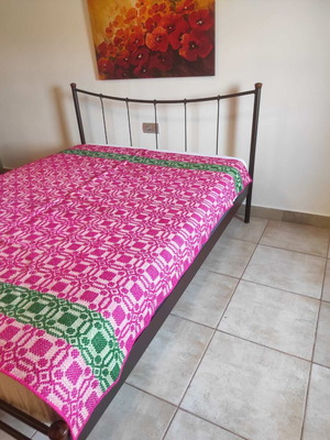 Traditional handwoven blanket pink and green, like new