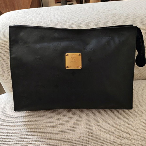 MCM unisex black nylon clutch used with leather interior