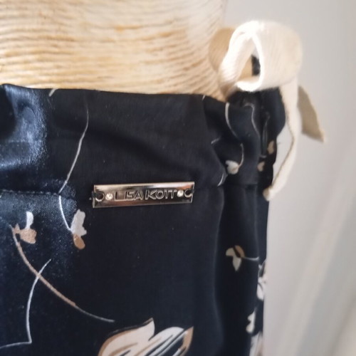 Lisa Kott women's pants used, size M/L, black and beige