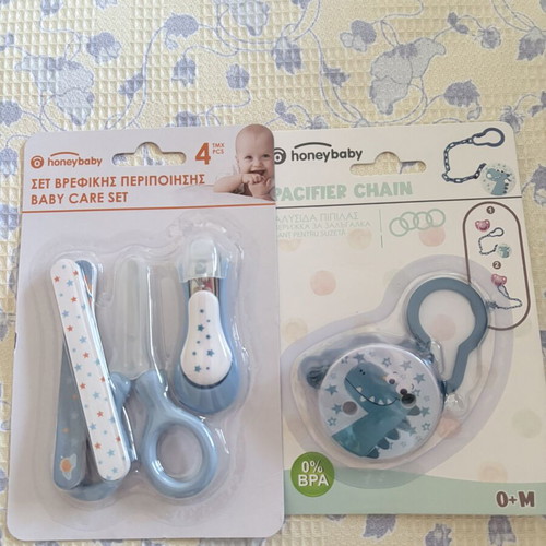 Baby care set and pacifier clip