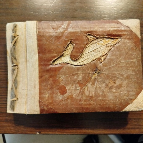 Photo album used with bamboo pages from Milos