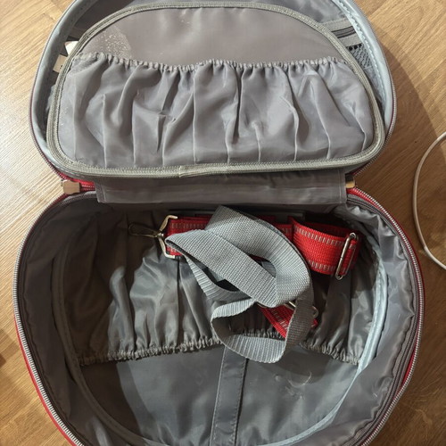Travel case like new, red with multiple compartments and strap