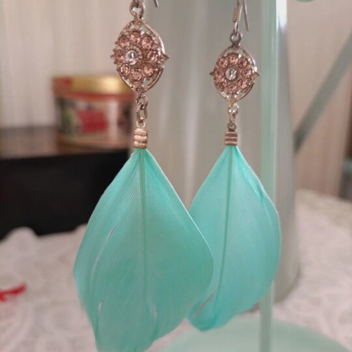 Accessorize long earrings like new, pink and green