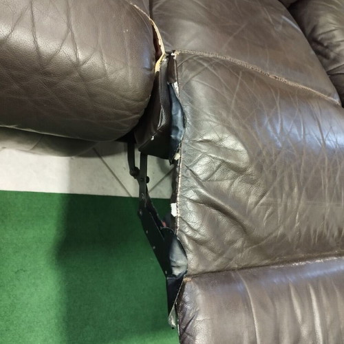 Three-seater black leather sofa with recline