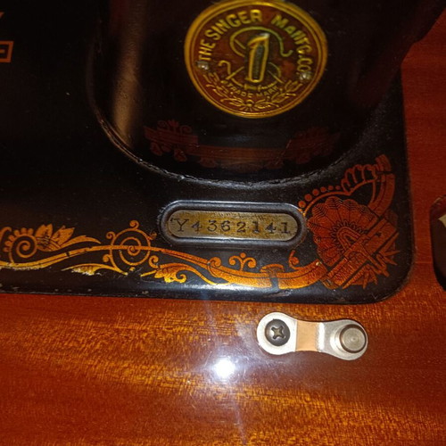 Singer Sewing Machine Model 66 like new with wooden cabinet