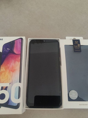 Samsung Galaxy A50 like new with original box, two covers, charger