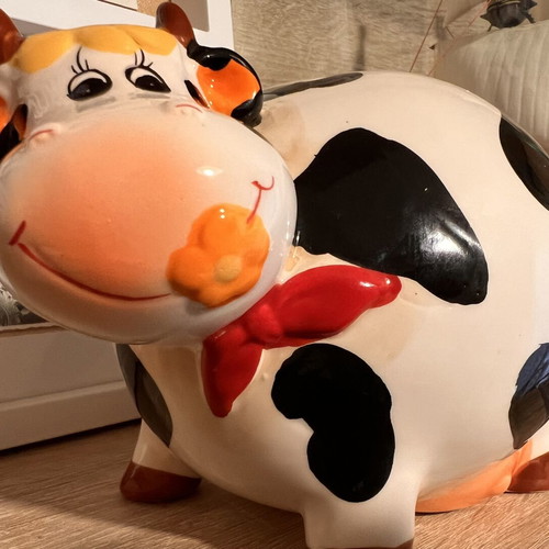 Ceramic Cow Piggy Bank like new, decorative and cute