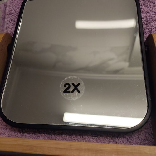 Two-dimensional tabletop mirror like new, rotating