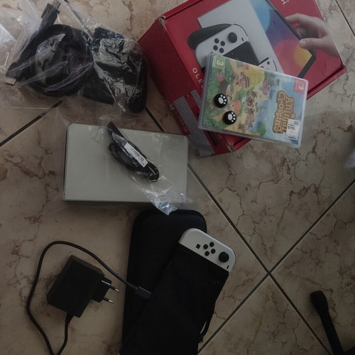 Nintendo Switch OLED White 64GB console with Animal Crossing and accessories