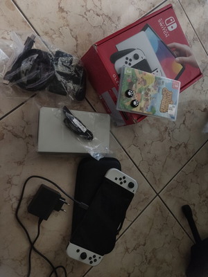 Nintendo Switch OLED White 64GB console with Animal Crossing and accessories