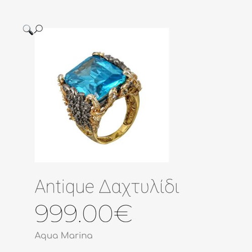 Silver ring plated with 9K gold, like new, blue topaz center