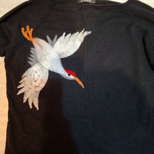 Axel blouse size 44 like new, knitted with embossed stork