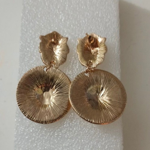 Pendant earrings with lion in gold color