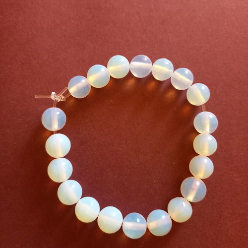 White bracelet with opal beads new