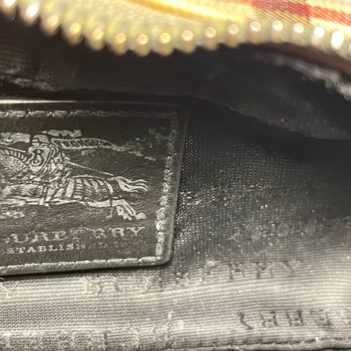 Burberry luxury toiletry bag used with defects