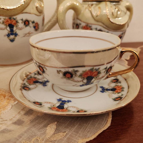 Hayasi Kutani Geisha porcelain tea set like new, 18 pieces