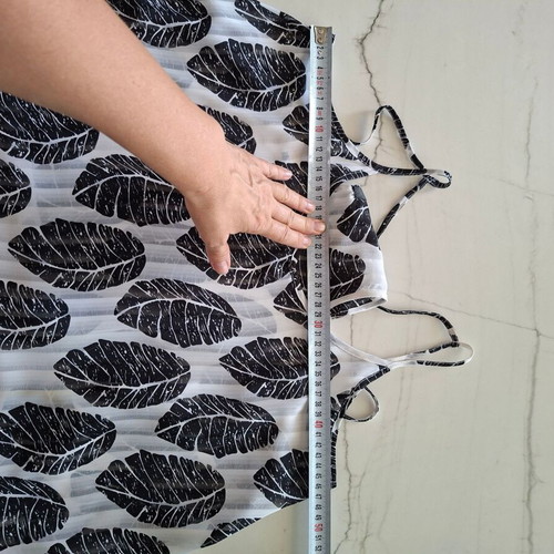 Top with leaf print one size like new, black and white
