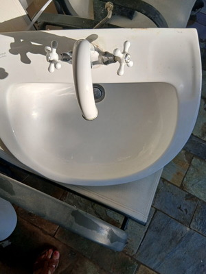 Gravena bathroom sink with built-in faucet like new