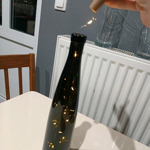 Bottle with cork and battery lights like new