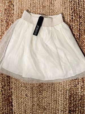 Skirt beige new with three layers of tulle and lining, size S