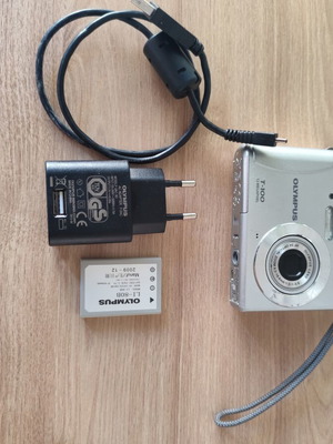 Olympus T-100 digital camera used with original battery and charger