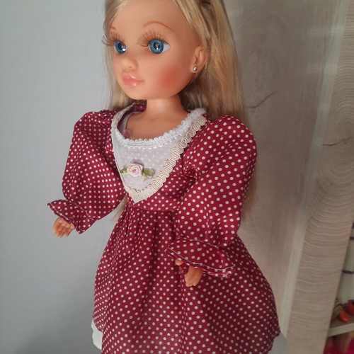 Nancy Famosa doll 2010 with 3 vintage dresses
