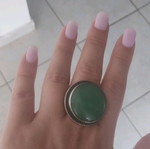 Silver round ring with green stone used, adjustable