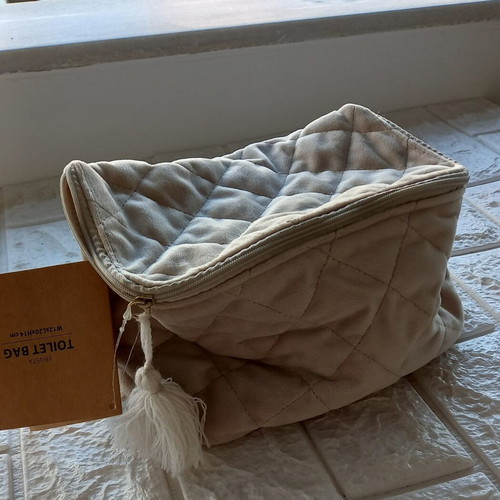 Toiletry bag new, beige synthetic velvet fabric