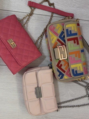 Mixed shoulder bags, black and colorful
