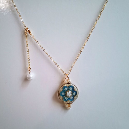 Handmade spring necklace new with blue, white and gold colors