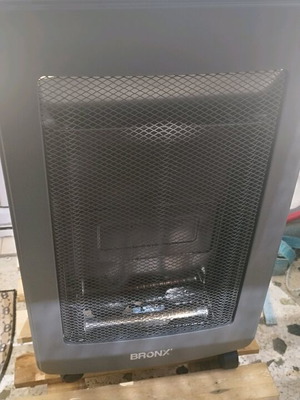 Gas heater used with safety shut-off button