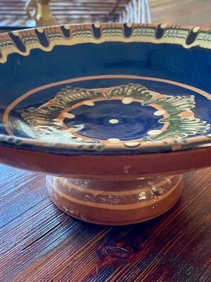Painted ceramic platter with foot used, handmade