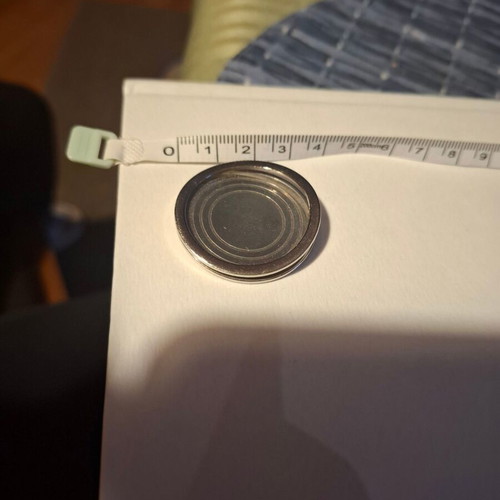 Folli Follie round metal pendant like new, silver color