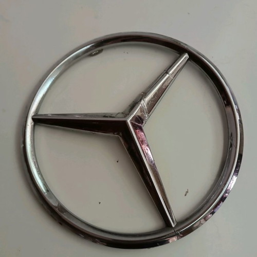 Plastic Mercedes emblem used from truck