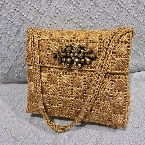 Women's handheld evening bag handmade from gold thread like new