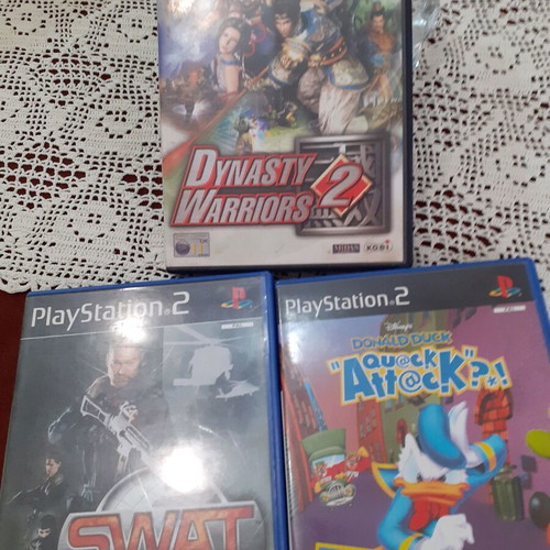 Pack of 3 used PS2 games Quack Attack, SWAT, Dynasty Warriors 2