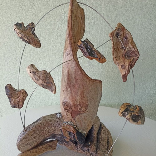 Handmade table decor with driftwood and metal design