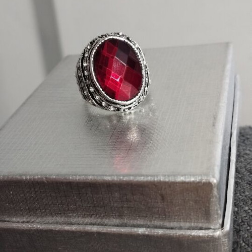 Statement cocktail ring with large red stone and rhinestones