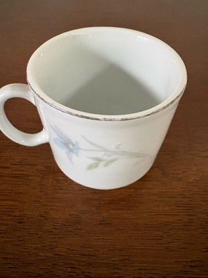 Porcelain coffee cup used with floral design