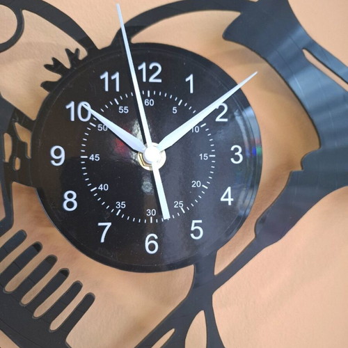 Wall clock made of vinyl new, silent operation 25x30 cm