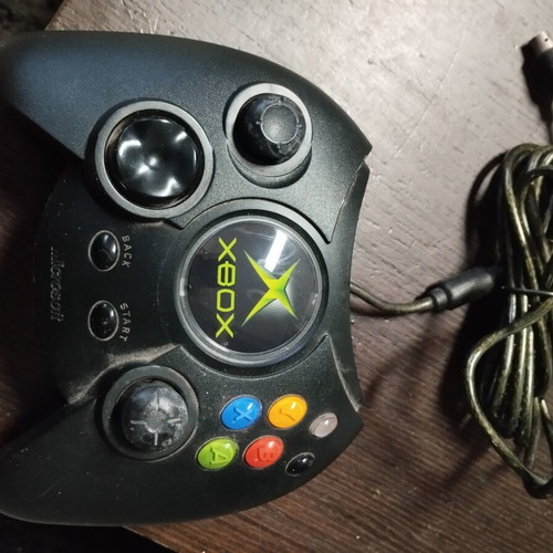 Original Microsoft Xbox console with controller and cables
