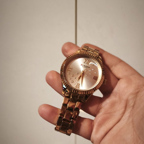 Curren 9009 watch with rhinestones like new, gold color