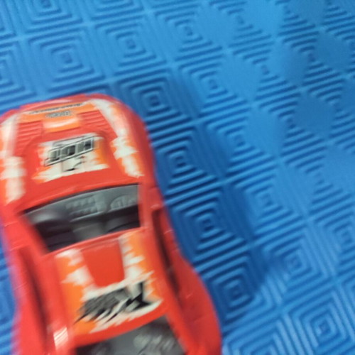 Set of 4 small toys like new, toy cars and motorcycle