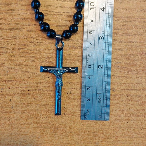 Necklace new with metal cross and hard resin beads